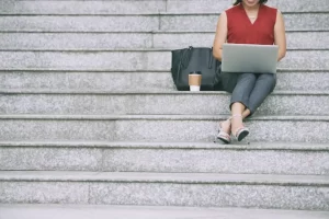 Business lady resting on stairs